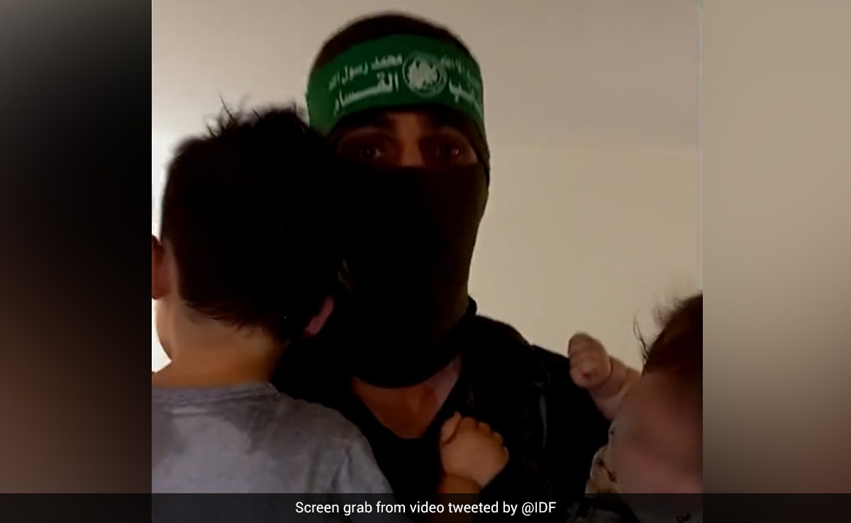 Infant in pram, rifles in hand: Hamas\' video of children taken from Israel